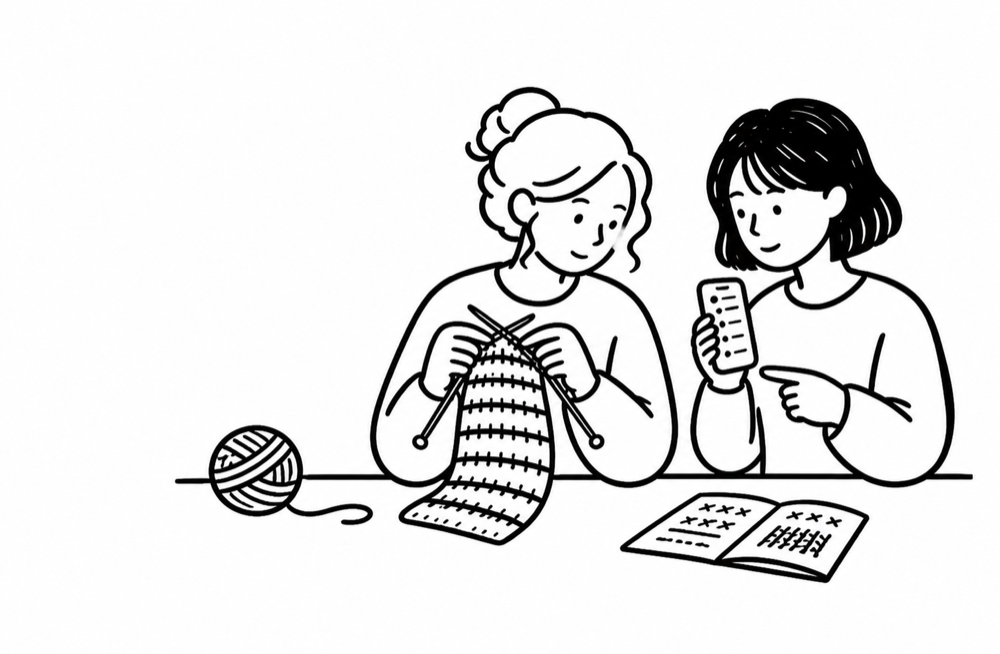 Two knitters using Purl together while working on a project